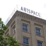 Brick building with Artspace sign on top